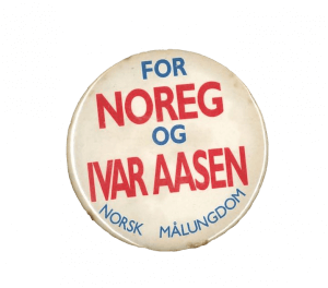 Jakkemerke laga av Norsk Målungdom kring 1993 med påskrifta «For Noreg og Ivar Aasen». Ukjend formgjevar.